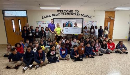 Rama Road ES check presentation with students
